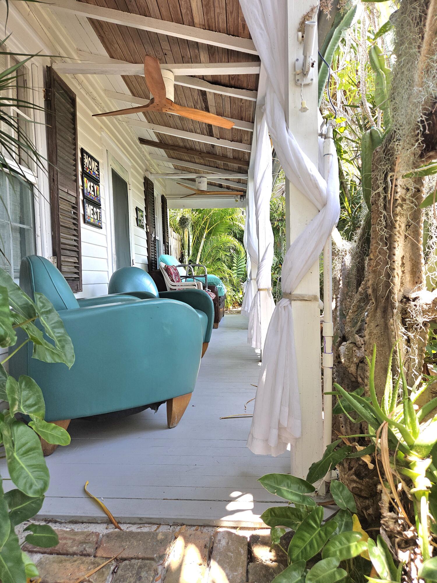 1015 Angela Street Key West, FL 33040 - Photo 10 of 42 a view of a house with a yard