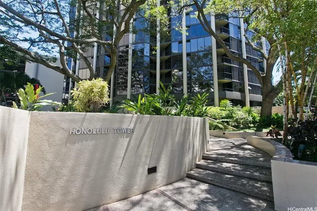 front view of a house with a garden