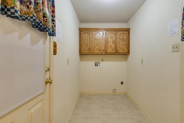a bathroom with a shower and a toilet