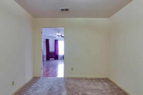 a view of livingroom with furniture and wooden floor