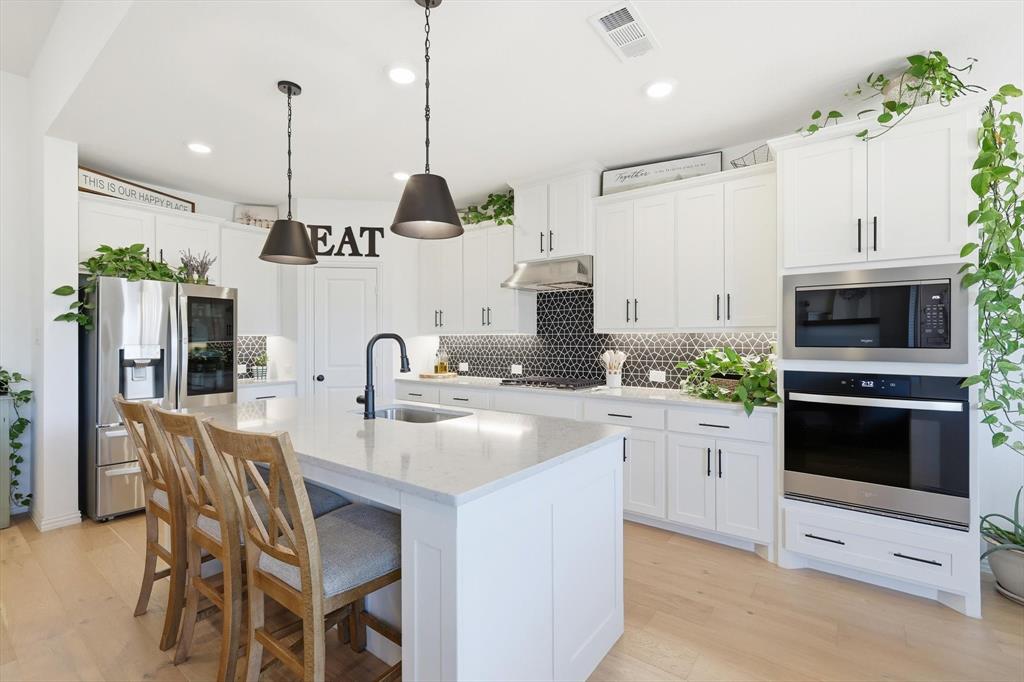 4420 Minnow Cove Oak Point, TX 75068 - Photo 14 of 39 Bright white cabinets
