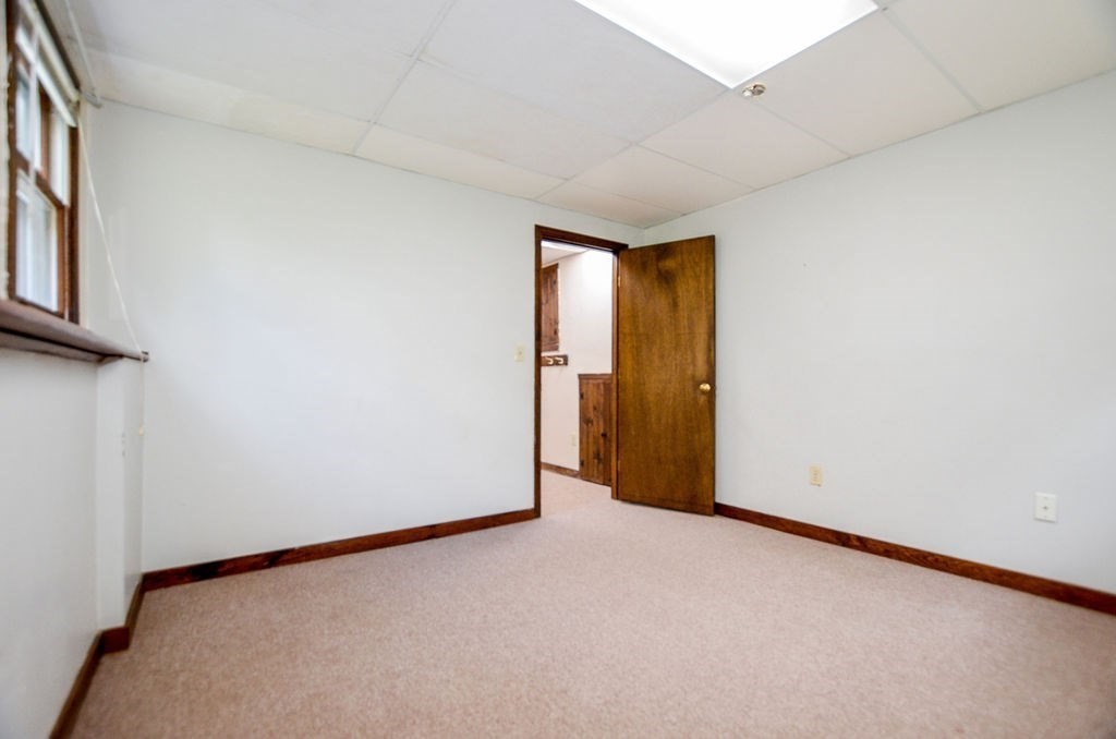 121 High Street Rochester, MA 02770 - Photo 27 of 33 a view of an empty room with a window