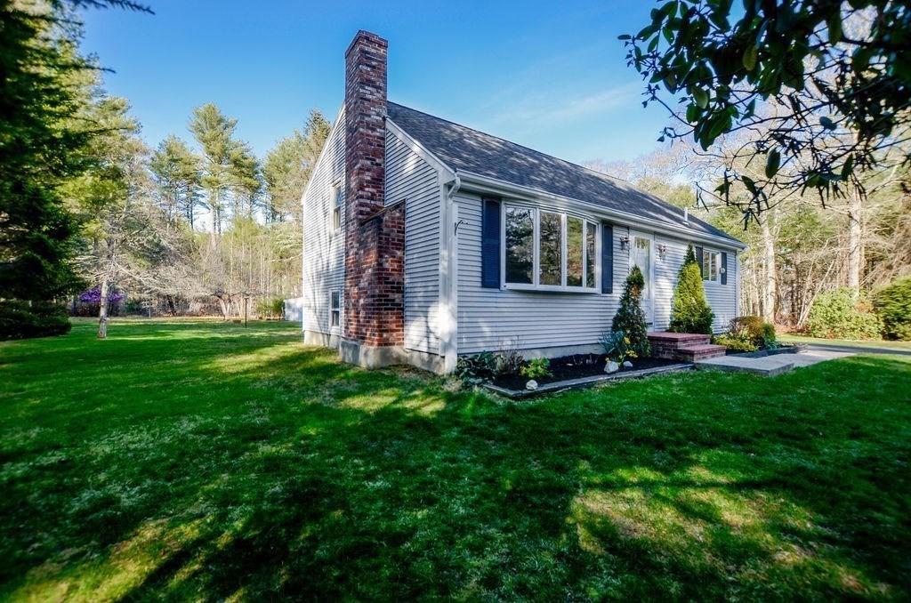 121 High Street Rochester, MA 02770 - Photo 4 of 33 a view of house with a yard