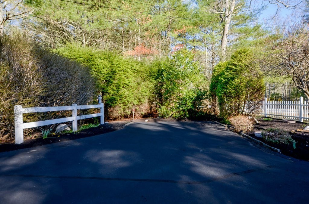 121 High Street Rochester, MA 02770 - Photo 7 of 33 a view of backyard with wooden floor and fence
