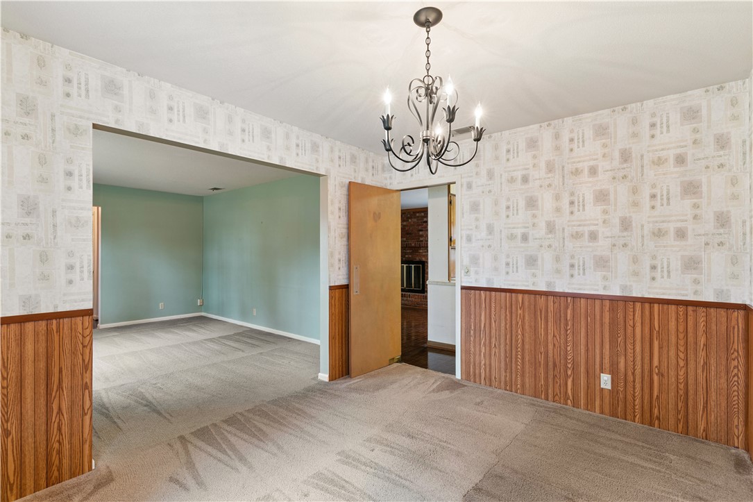 237 King Cotton Road Brunswick, GA 31525 - Photo 13 of 43 Dining area off of living room, with pass thru to kitchen.
