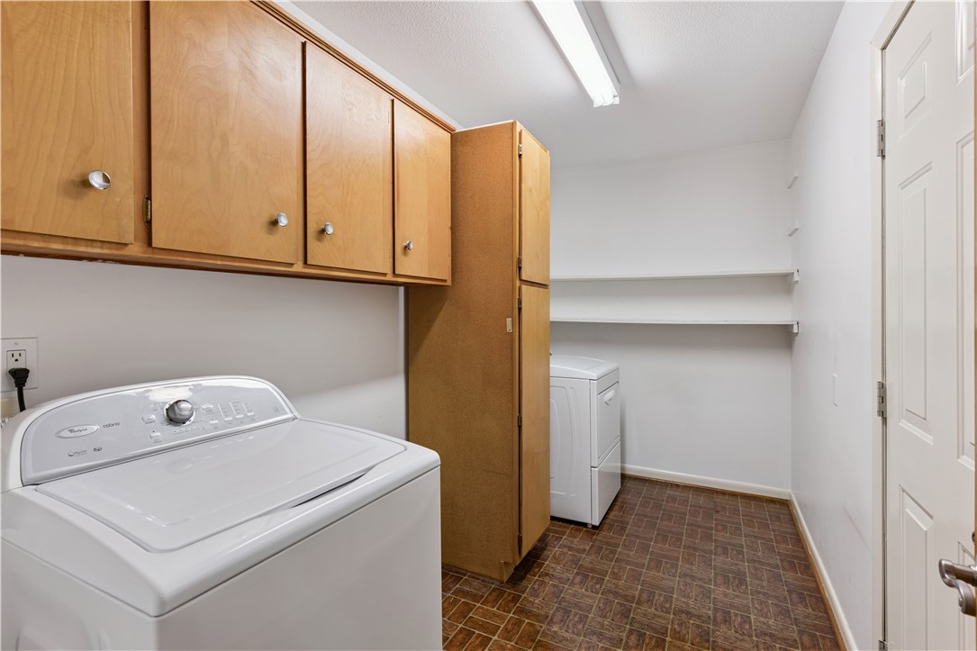 237 King Cotton Road Brunswick, GA 31525 - Photo 29 of 43 Laundry room off of kitchen, with access to garage.