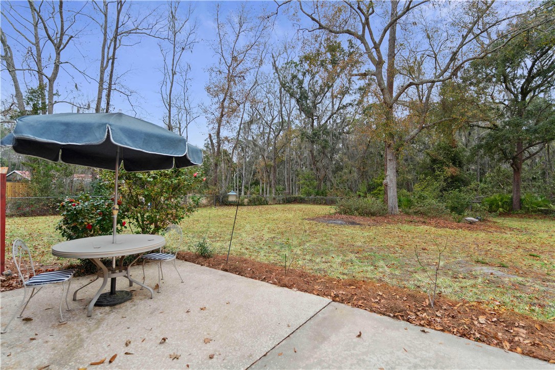 237 King Cotton Road Brunswick, GA 31525 - Photo 30 of 43 Great backyard! Fully fenced with wooded back for more privacy.