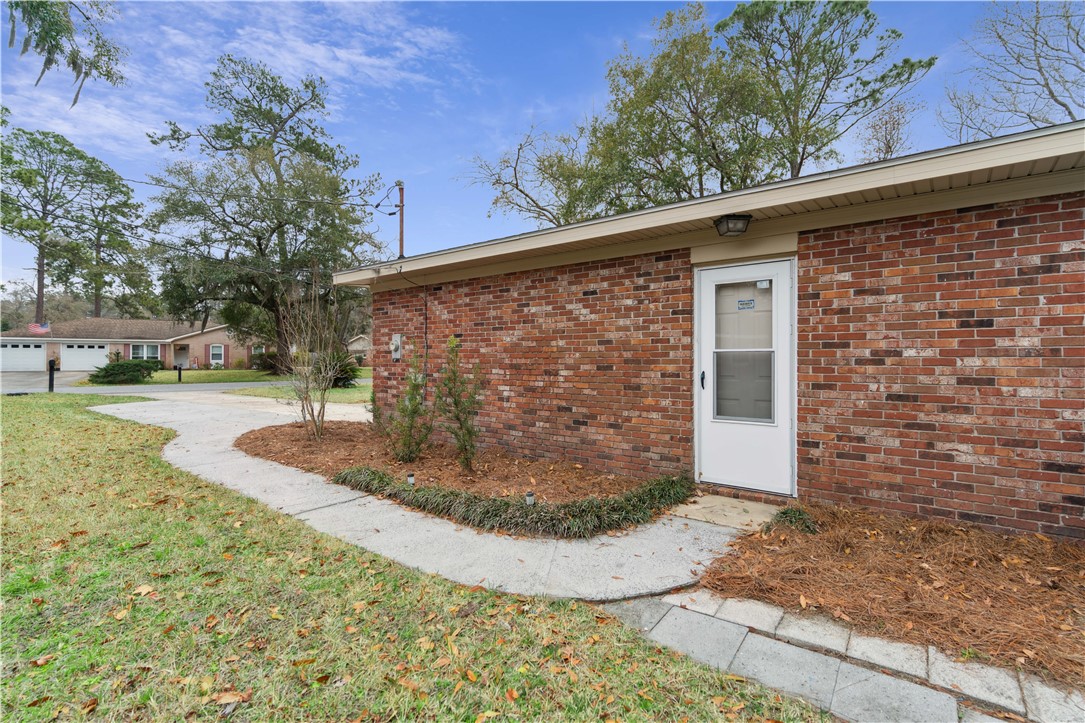 237 King Cotton Road Brunswick, GA 31525 - Photo 8 of 43 I love this side entry into garage.