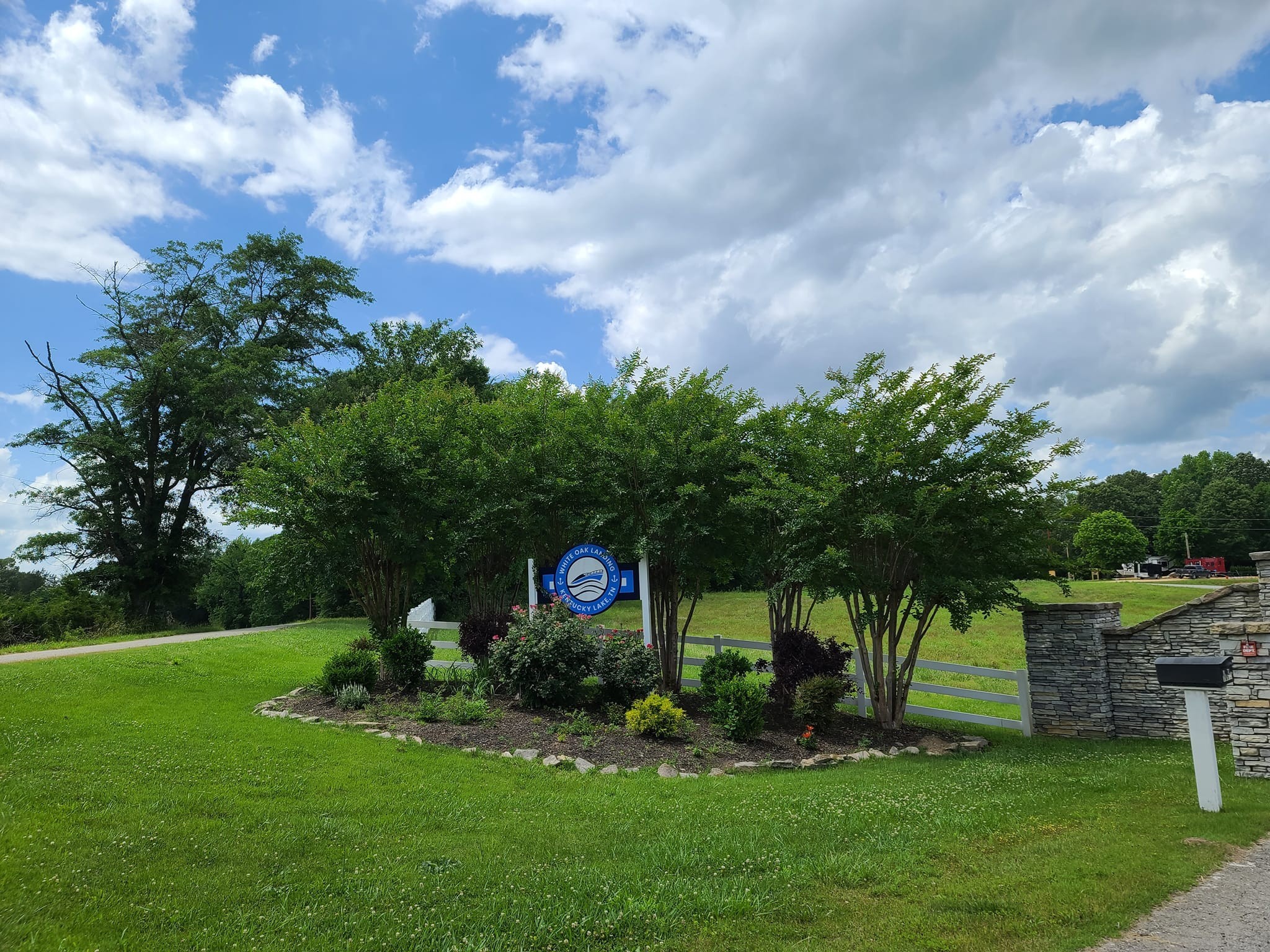 368 Duck Blind Road Clifton, TN 38425 - Photo 33 of 46 a view of a garden with a house in the background