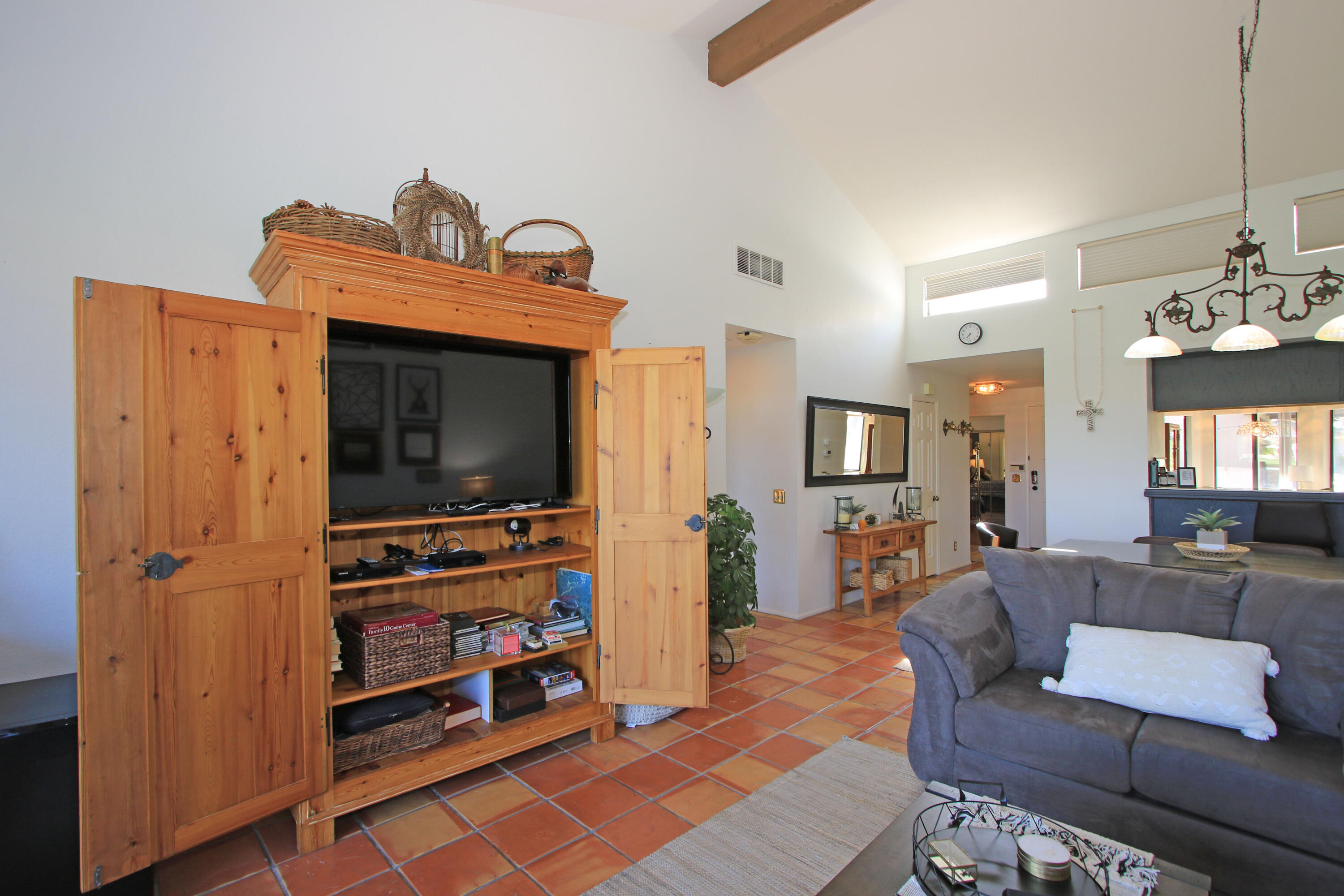 72 Old Ranch Road Palm Desert, CA 92211 - Photo 16 of 35 a living room with furniture and a flat screen tv