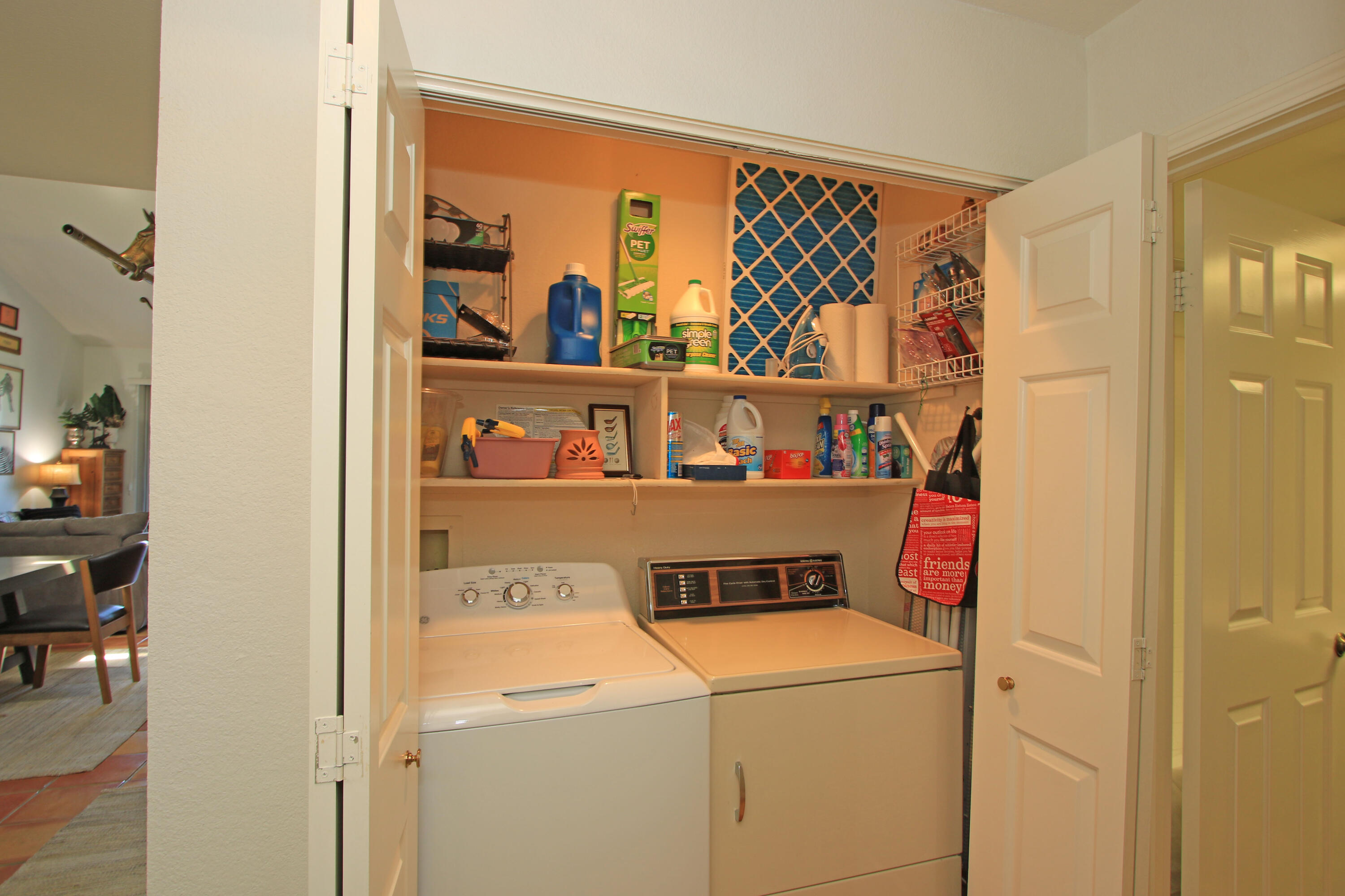72 Old Ranch Road Palm Desert, CA 92211 - Photo 19 of 35 a view of storage and utility room with washer and dryer