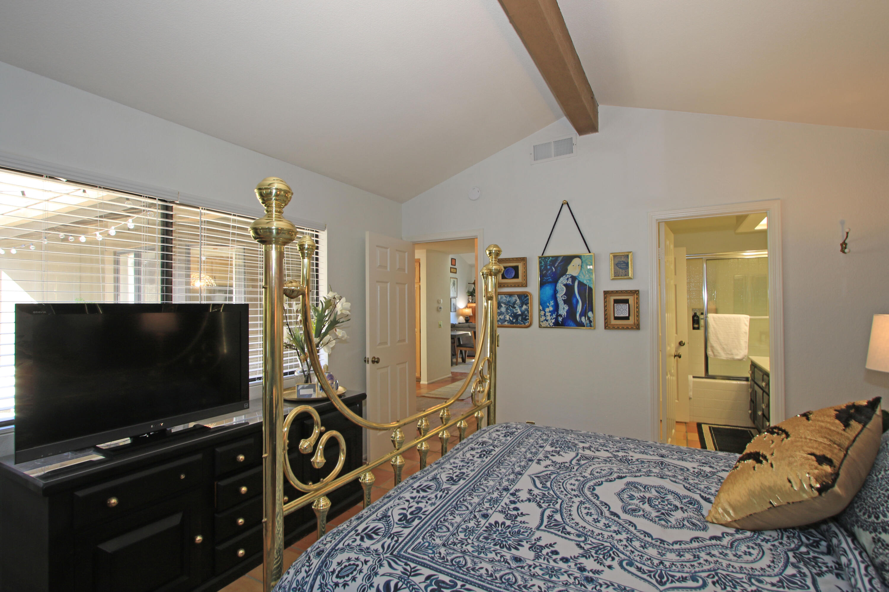 72 Old Ranch Road Palm Desert, CA 92211 - Photo 21 of 35 a living room with furniture and a flat screen tv