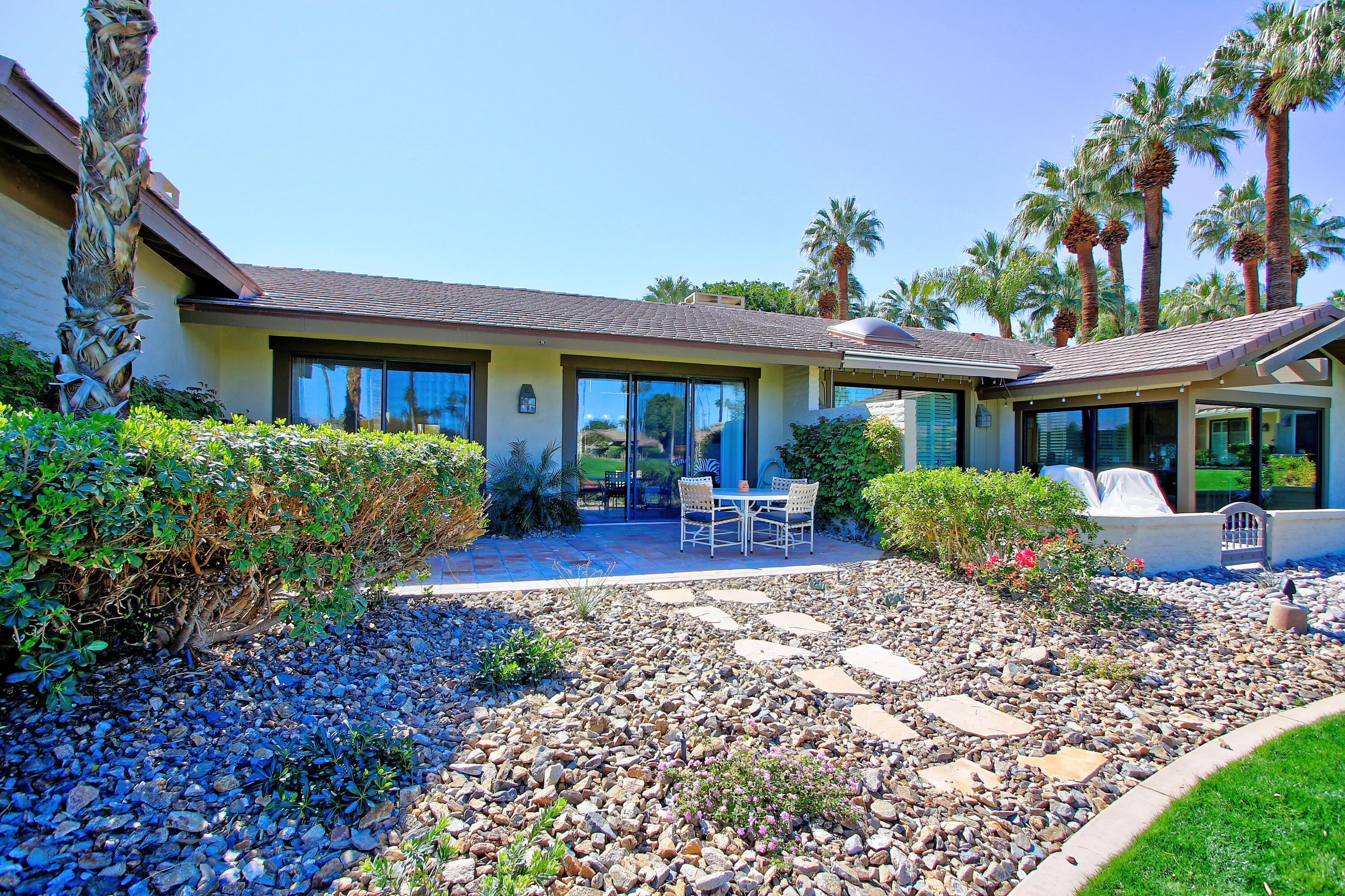 72 Old Ranch Road Palm Desert, CA 92211 - Photo 24 of 35 a view of a house with a yard