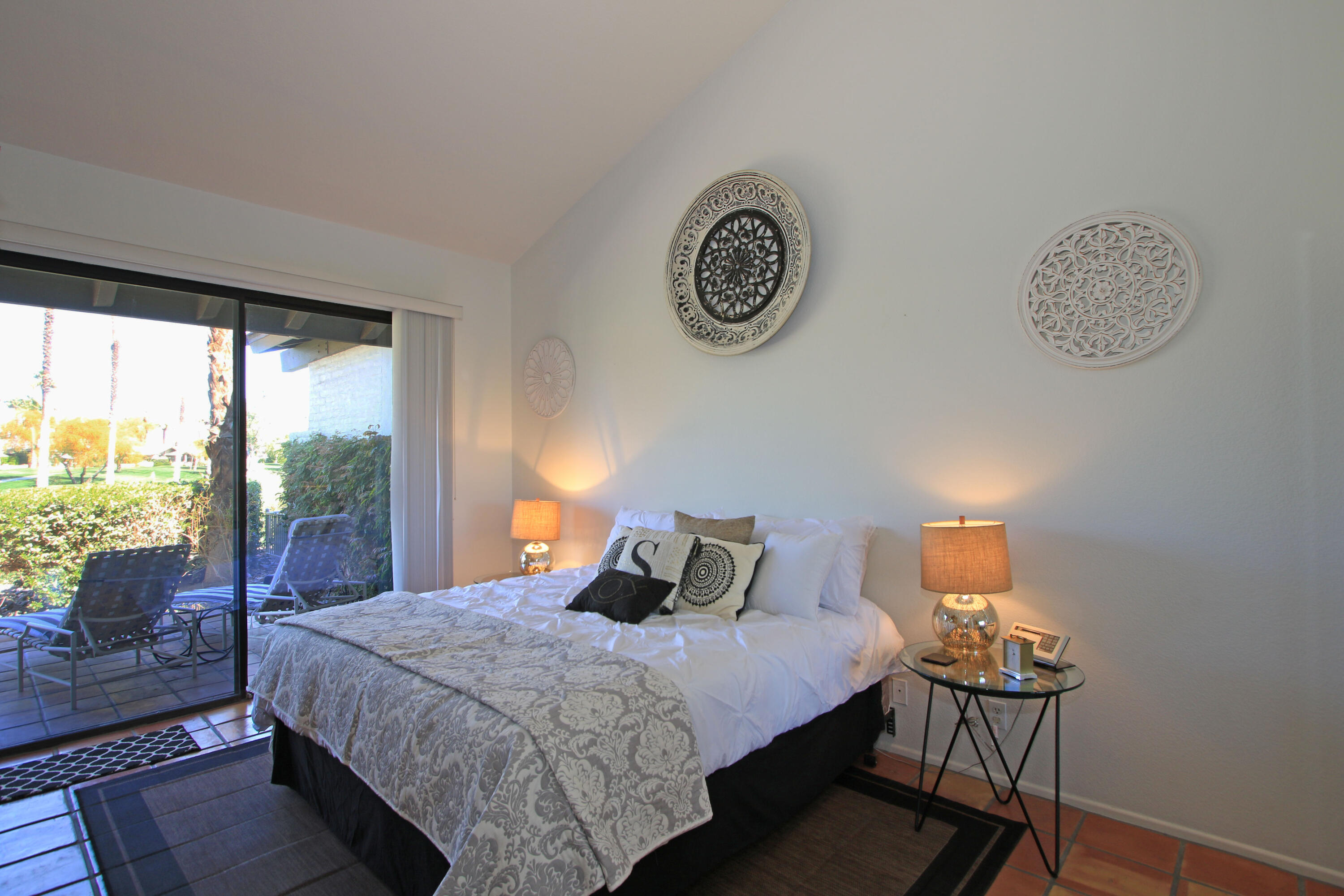 72 Old Ranch Road Palm Desert, CA 92211 - Photo 26 of 35 a bedroom with a bed and a window