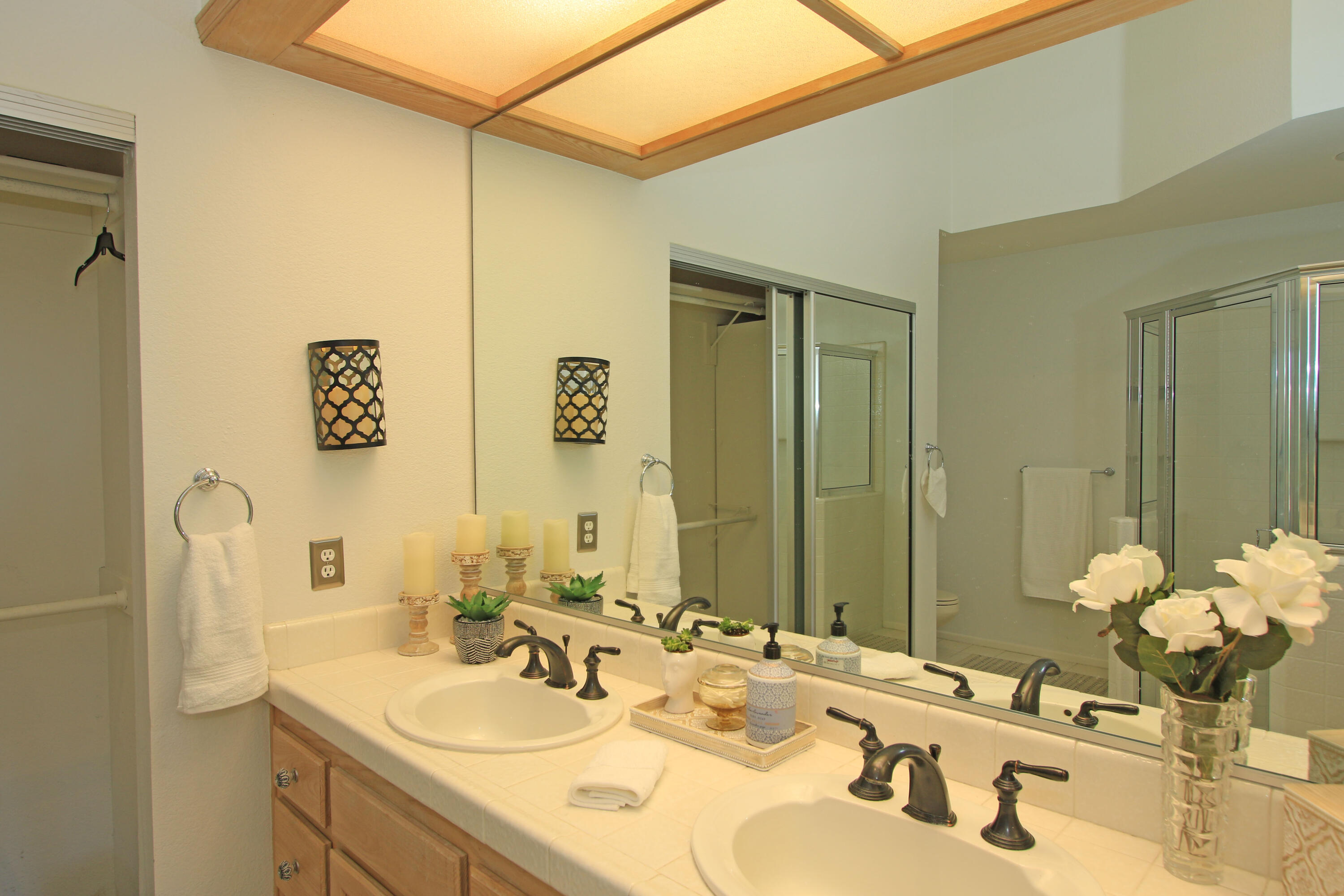72 Old Ranch Road Palm Desert, CA 92211 - Photo 32 of 35 a bathroom with a sink and a mirror