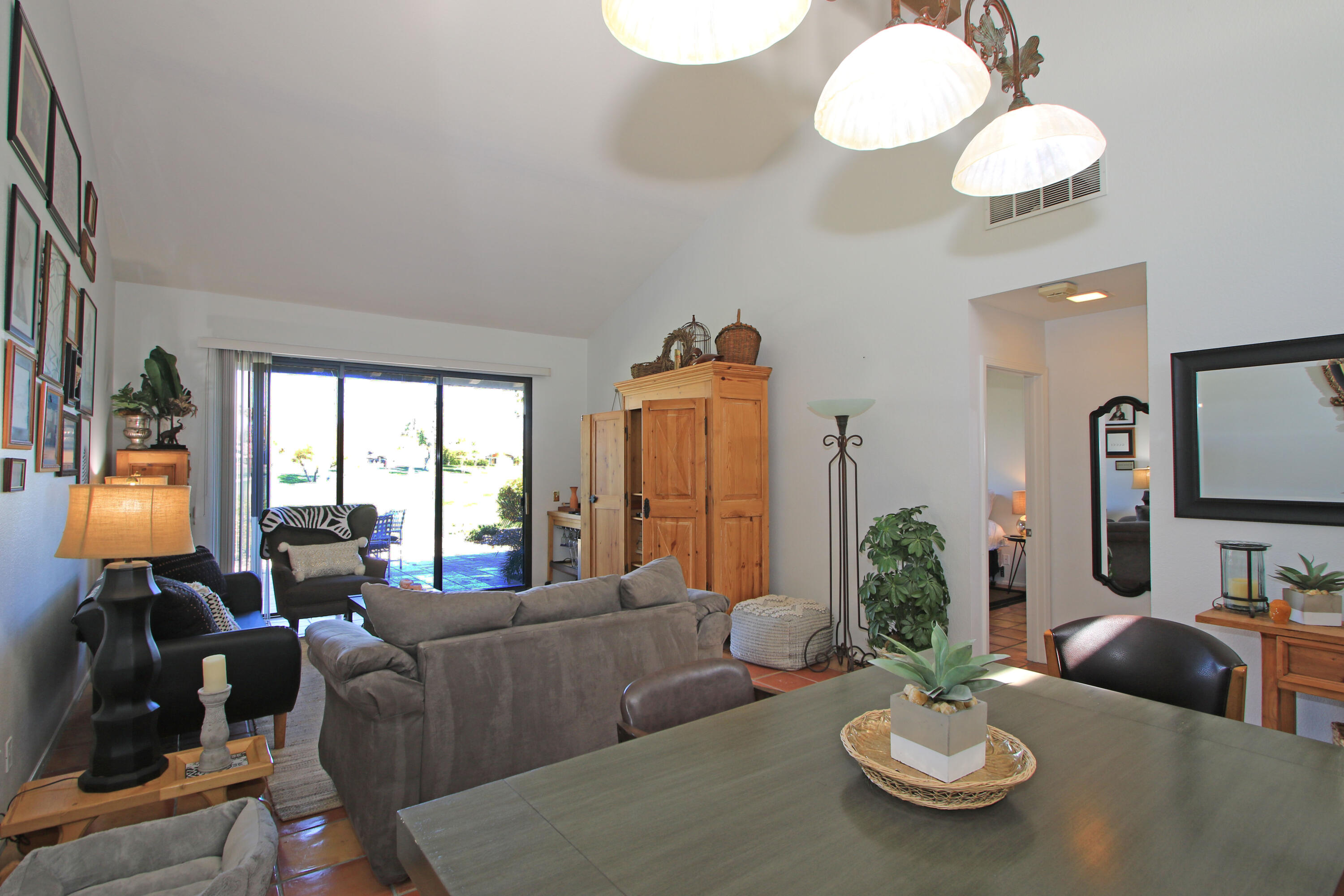 72 Old Ranch Road Palm Desert, CA 92211 - Photo 9 of 35 a living room with furniture and a large window