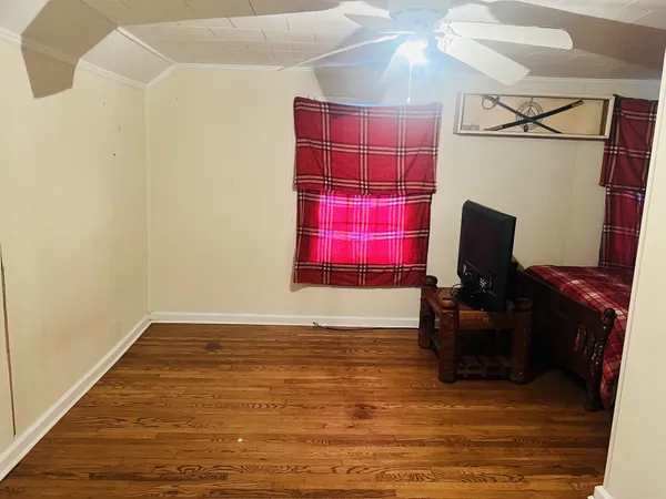 a view of livingroom with wooden floor