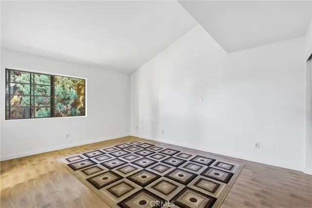 an empty room with a bed