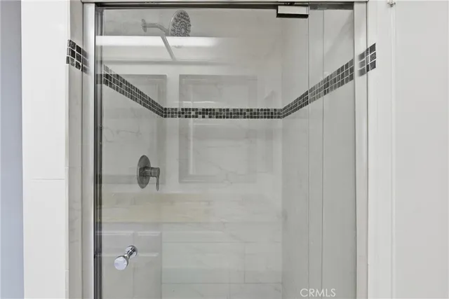 a close view of a shower in bathroom