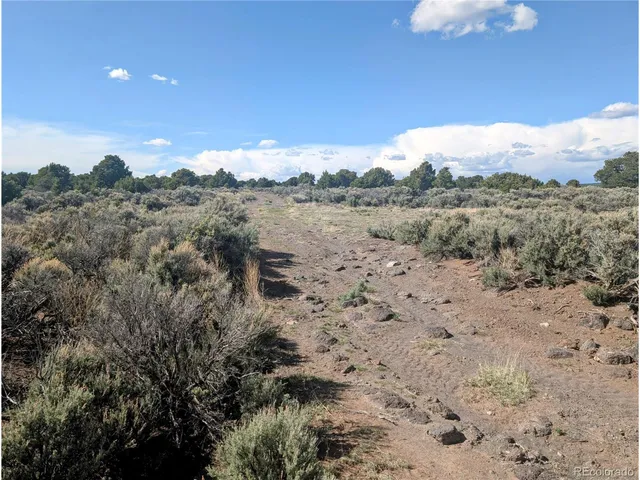 a view of mountain view with lots of trees