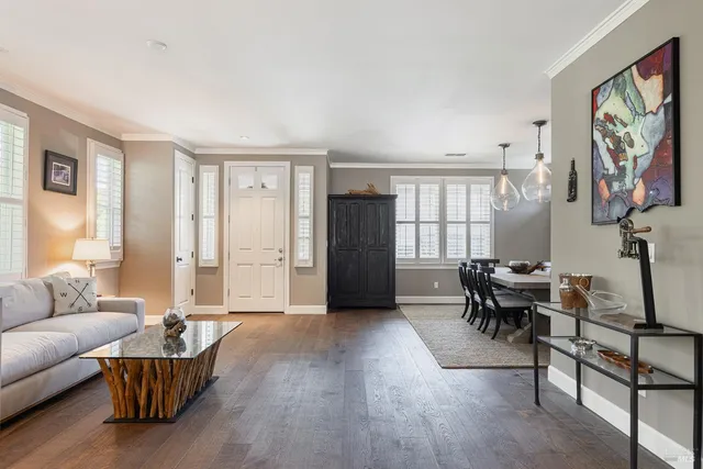 a kitchen with stainless steel appliances granite countertop a stove and a refrigerator