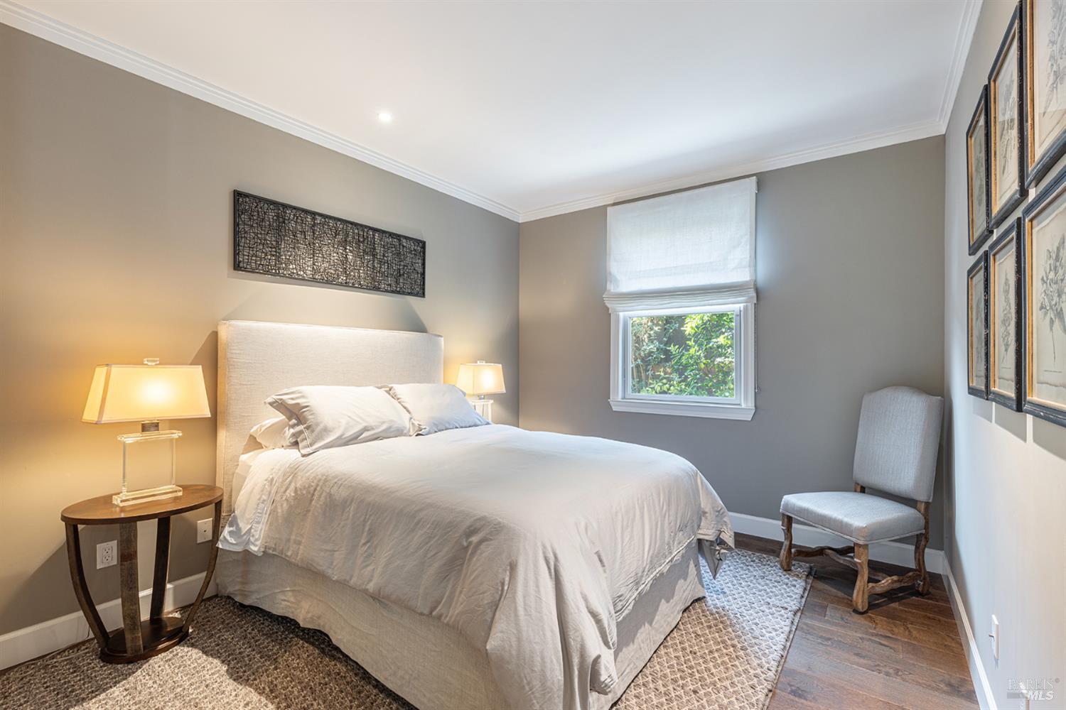 1982 Adams Street Yountville, CA 94599 - Photo 33 of 69 a bedroom with a bed a lamp on desk and a window