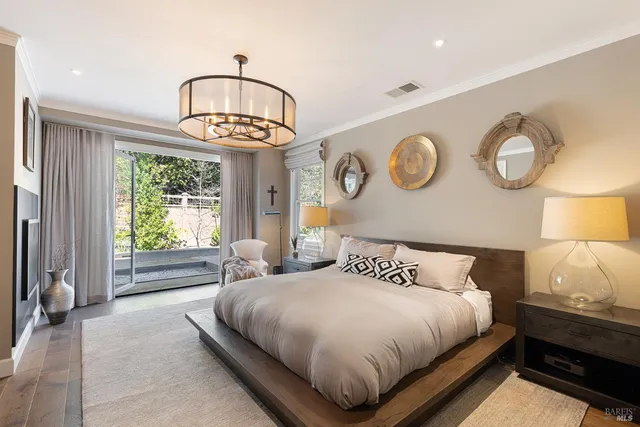 a living room with furniture window and wooden floor