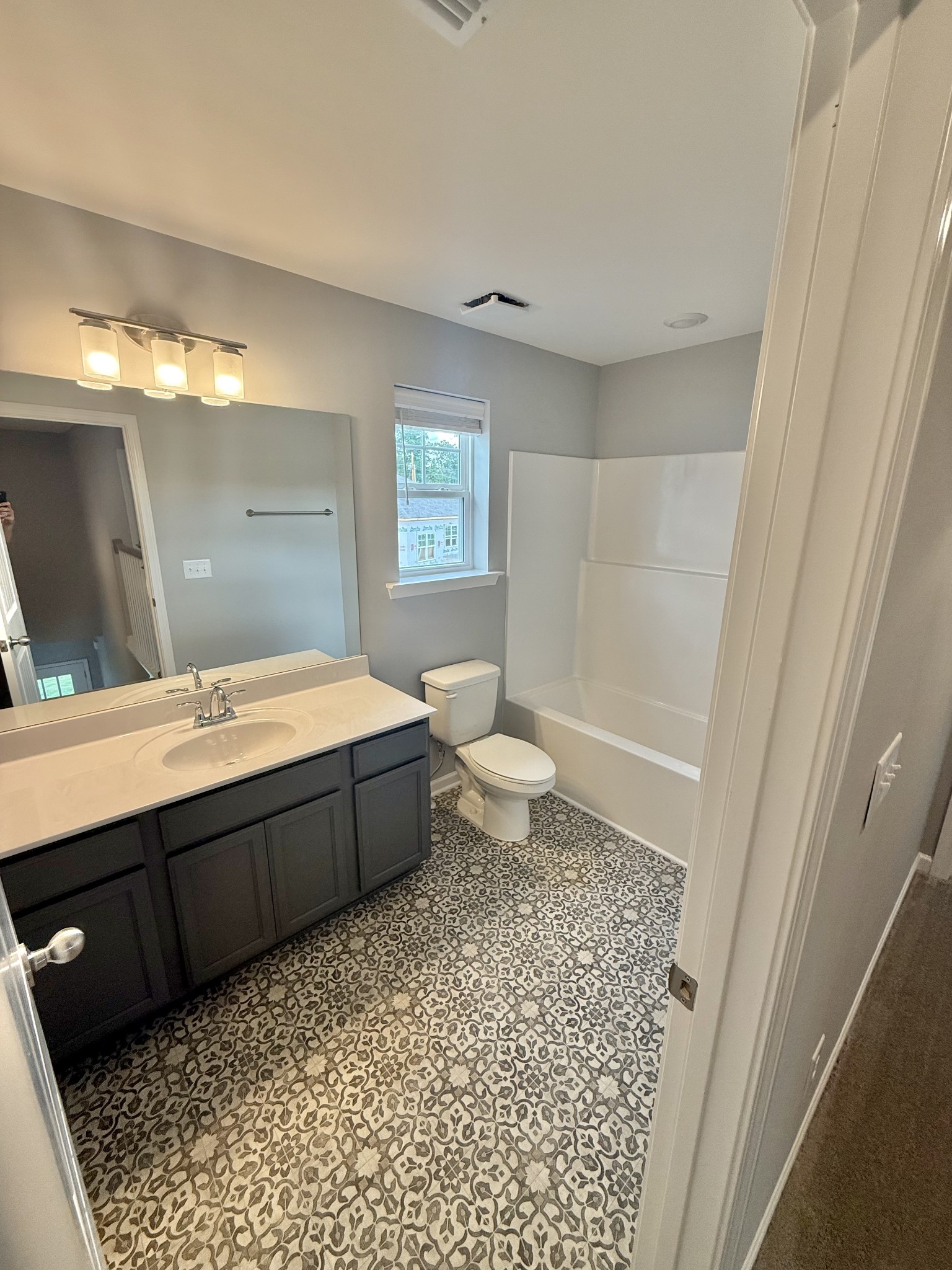 5 Country Circle Manchester, TN 37355 - Photo 11 of 13 a spacious bathroom with a bathtub sink and toilet