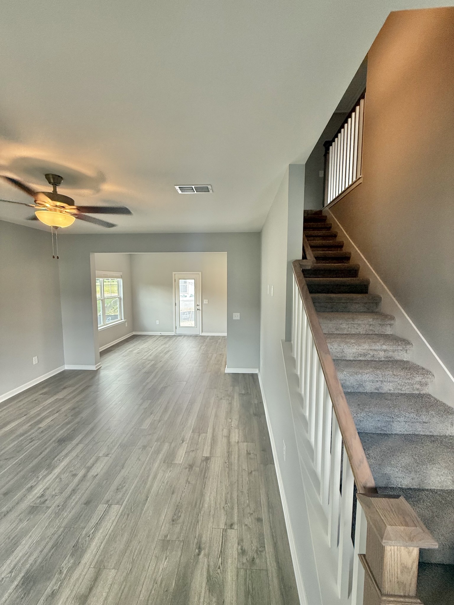 5 Country Circle Manchester, TN 37355 - Photo 3 of 13 a view of an empty room and wooden floor