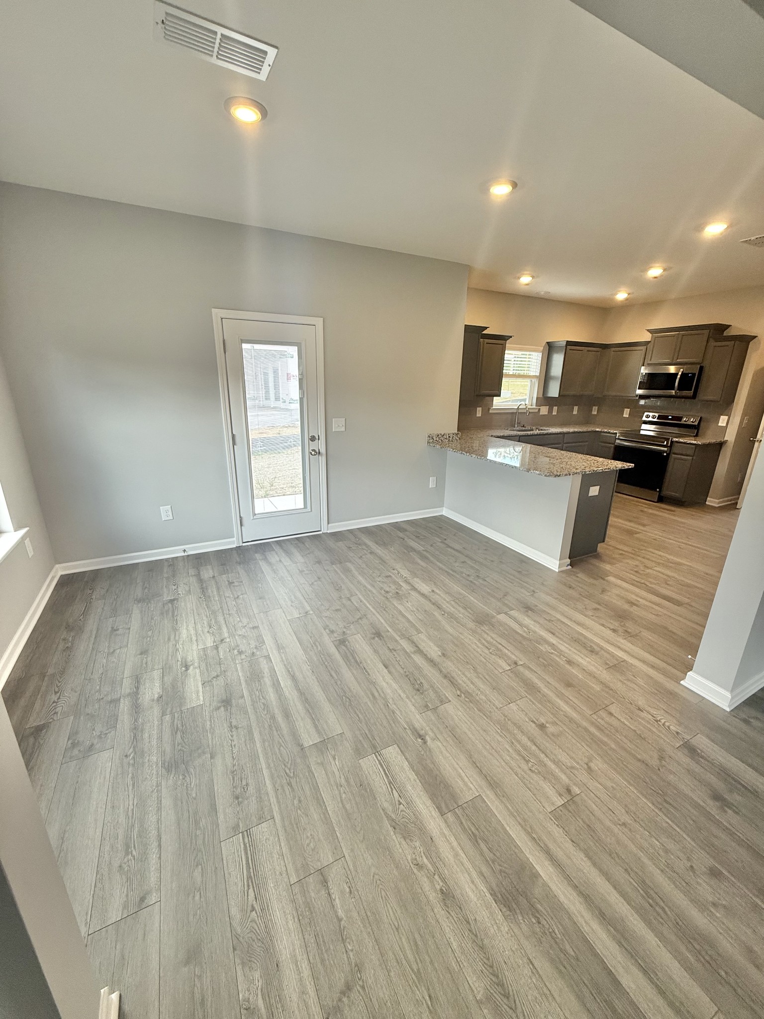 5 Country Circle Manchester, TN 37355 - Photo 4 of 13 a view of kitchen with cabinets and wooden floor