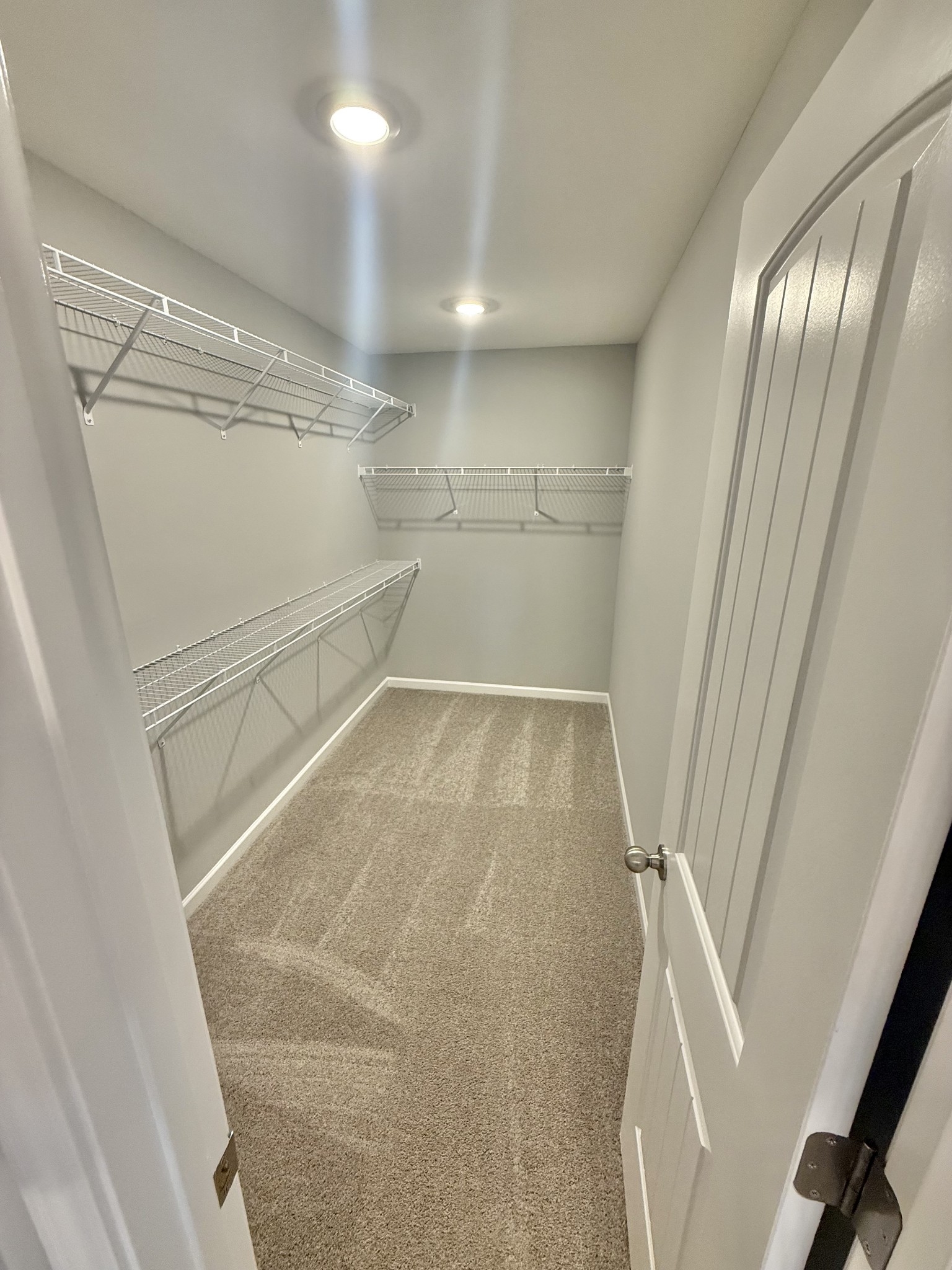 5 Country Circle Manchester, TN 37355 - Photo 9 of 13 a view of walk in closet with empty racks