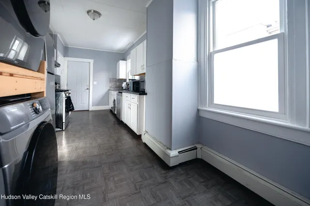 a close view of a fireplace in empty room