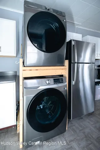 a bathroom with a sink toilet and a shower