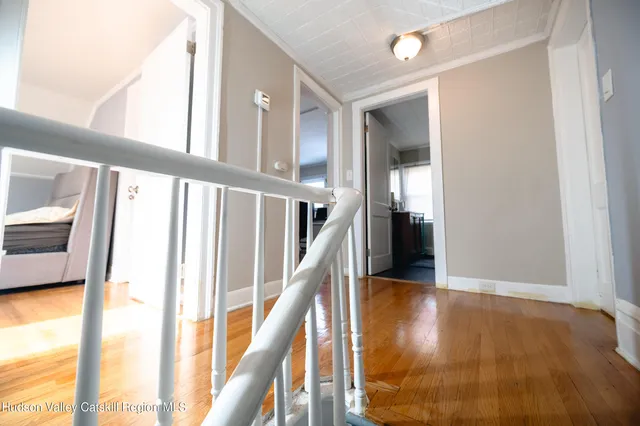 a kitchen with a refrigerator and window