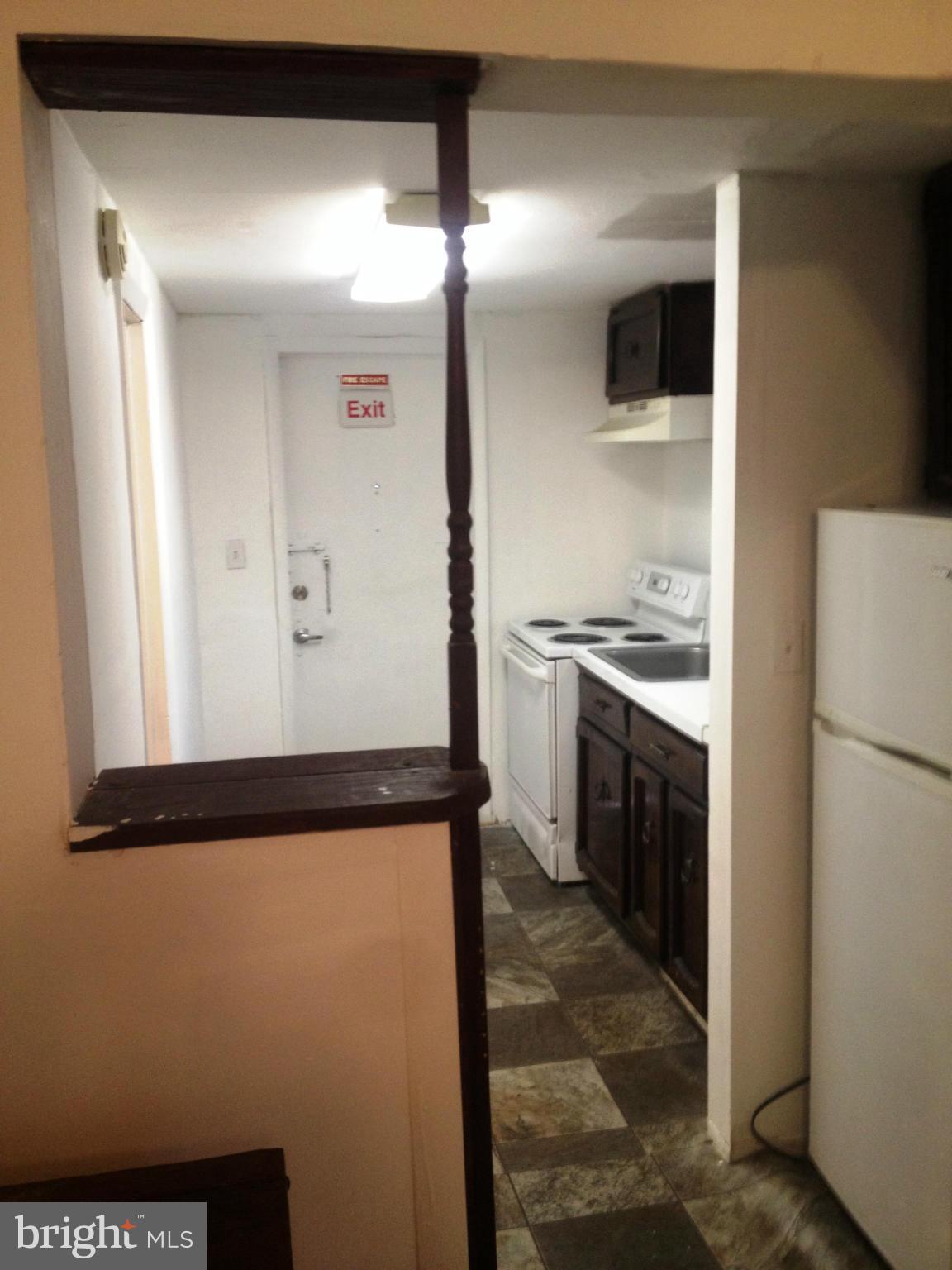 5911 Addison Road Capitol Heights, MD 20743 - Photo 4 of 29 UPSTAIRS APT - KITCHEN
