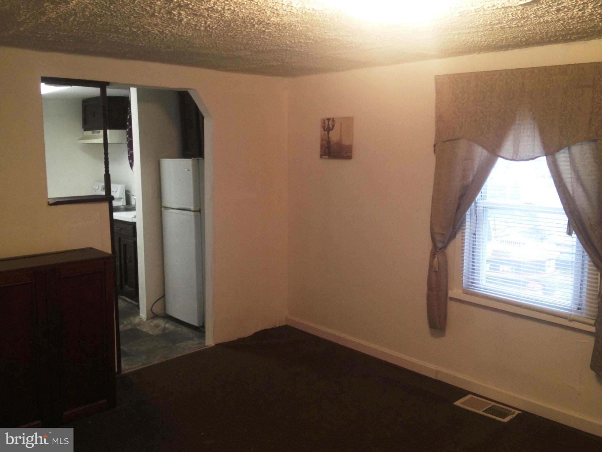 5911 Addison Road Capitol Heights, MD 20743 - Photo 5 of 29 UPSTAIRS APT - LIVING ROOM