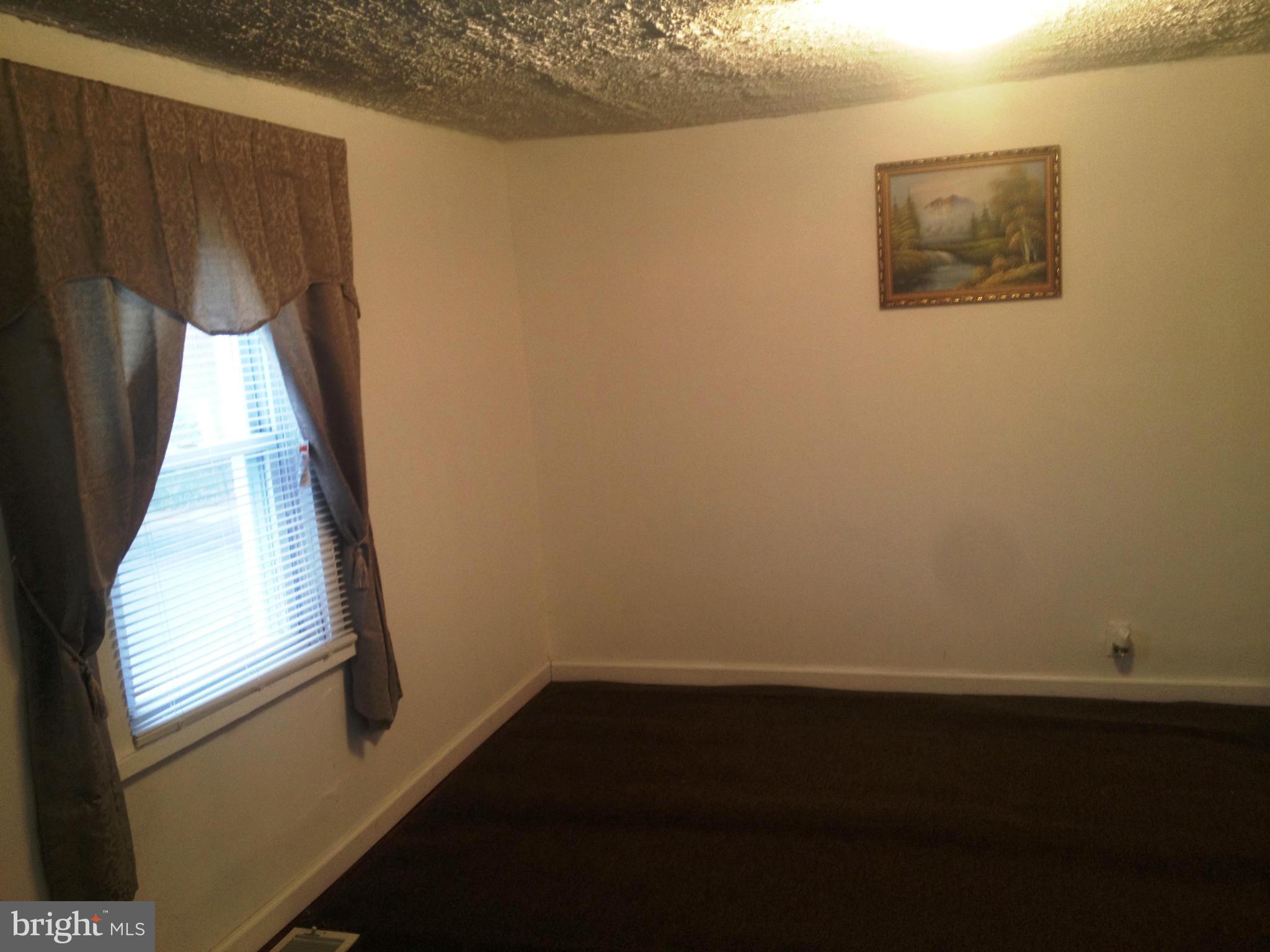 5911 Addison Road Capitol Heights, MD 20743 - Photo 6 of 29 UPSTAIRS APT - LIVING ROOM