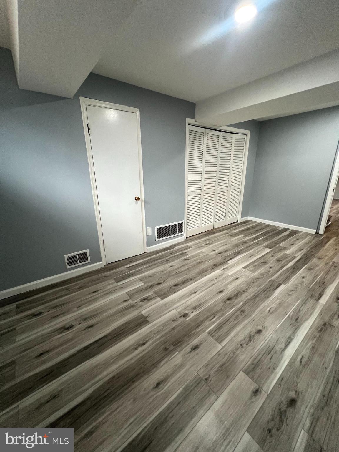 11823 Falls Road Potomac, MD 20854 - Photo 11 of 20 a view of room with wooden floor