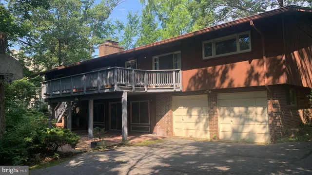 a front view of a house with a garage