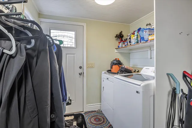 a view of a house with a door and a window