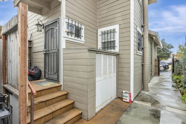 a front view of a house with a fence