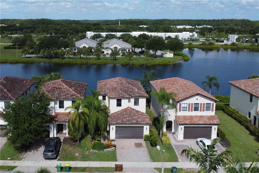 5289 Beckton Road Immokalee, FL 34142 - Photo 25 of 37 an aerial view of a house with a lake view