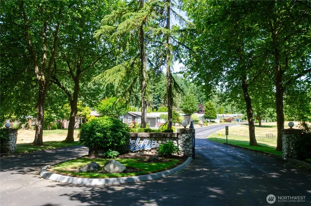 a view of outdoor space with deck and trees