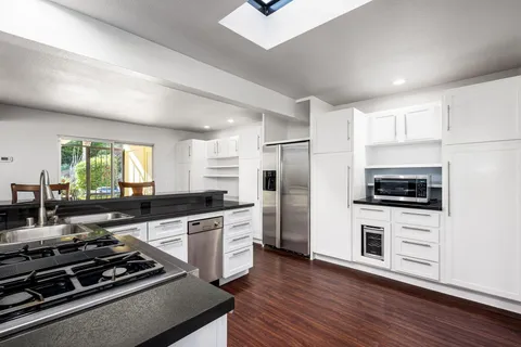 a room with furniture and a chandelier