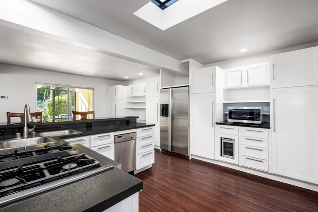 a room with furniture and a chandelier