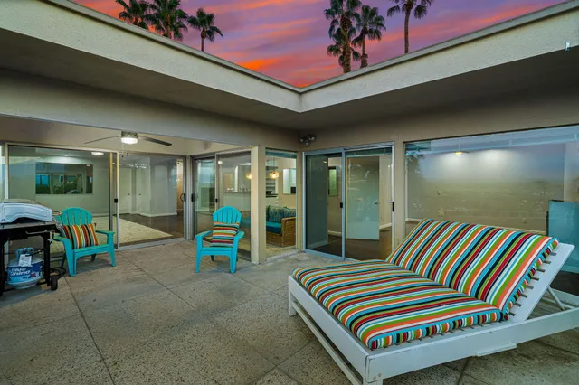 a view of a living room and dining room