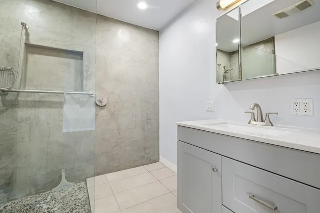 a view of empty room with window and fireplace