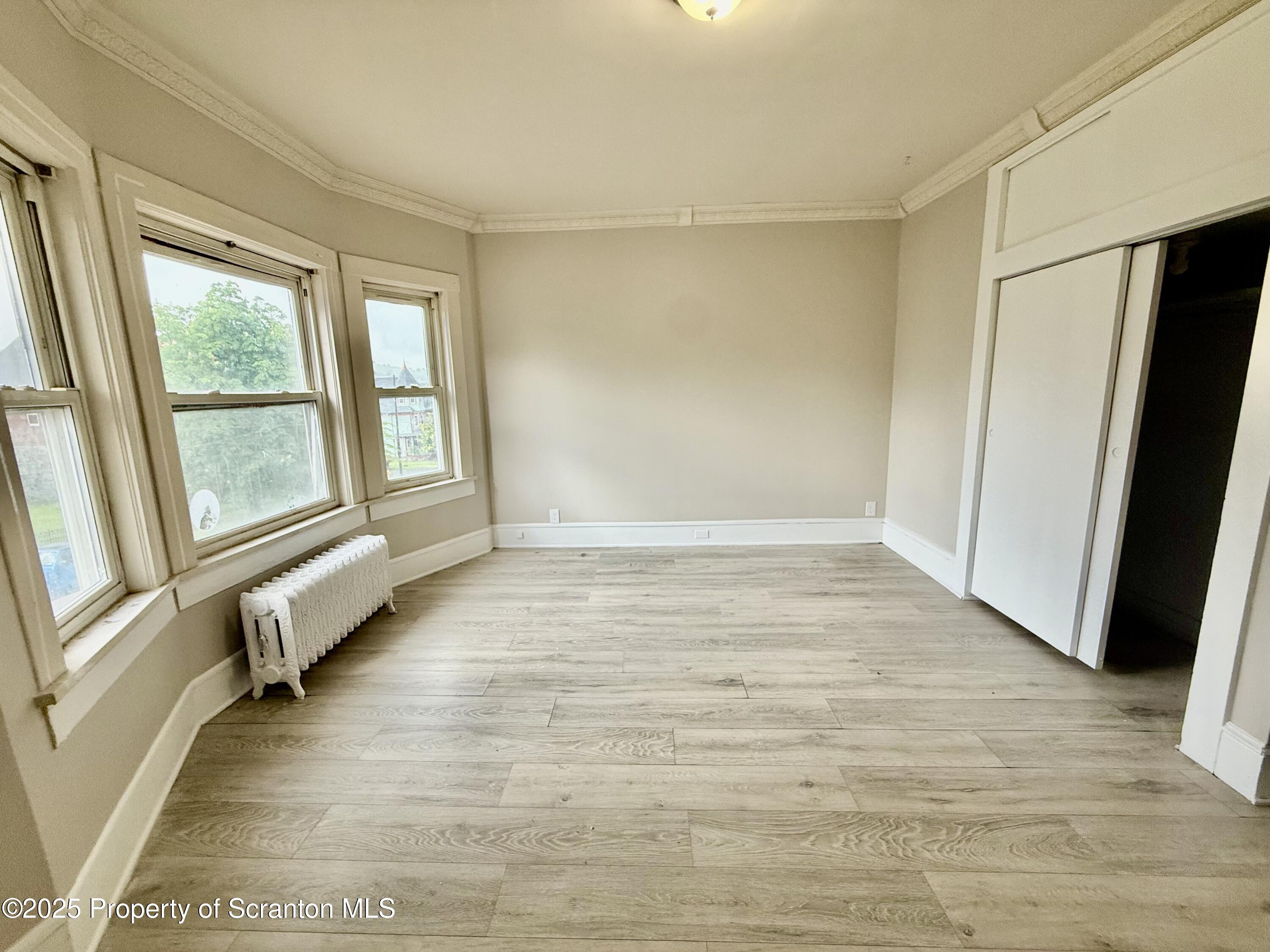 611 Harrison Avenue Scranton, PA 18510 - Photo 14 of 18 a view of an empty room with a window