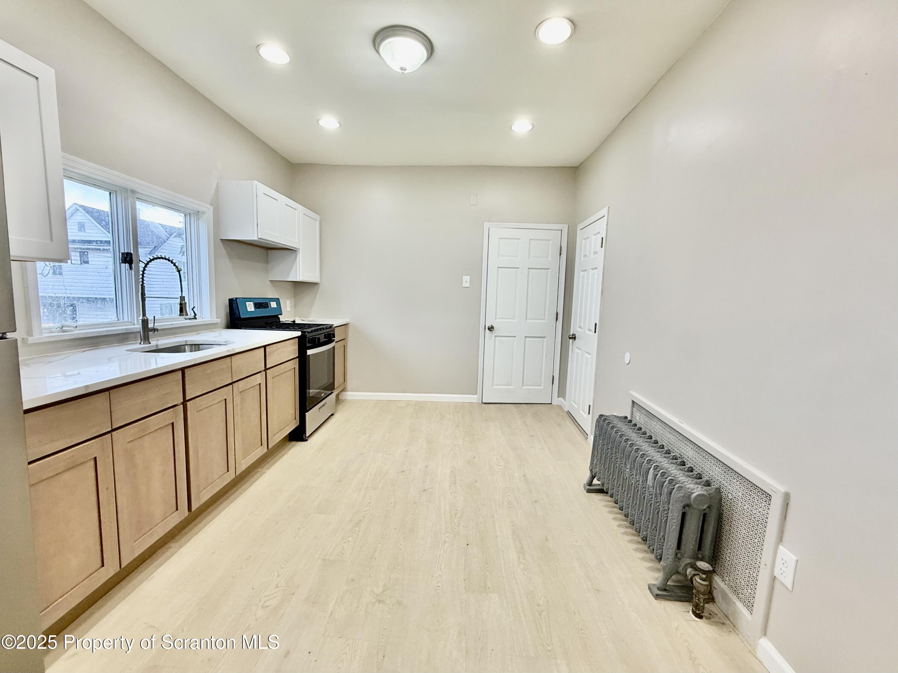 611 Harrison Avenue Scranton, PA 18510 - Photo 4 of 18 a view of a kitchen with a sink