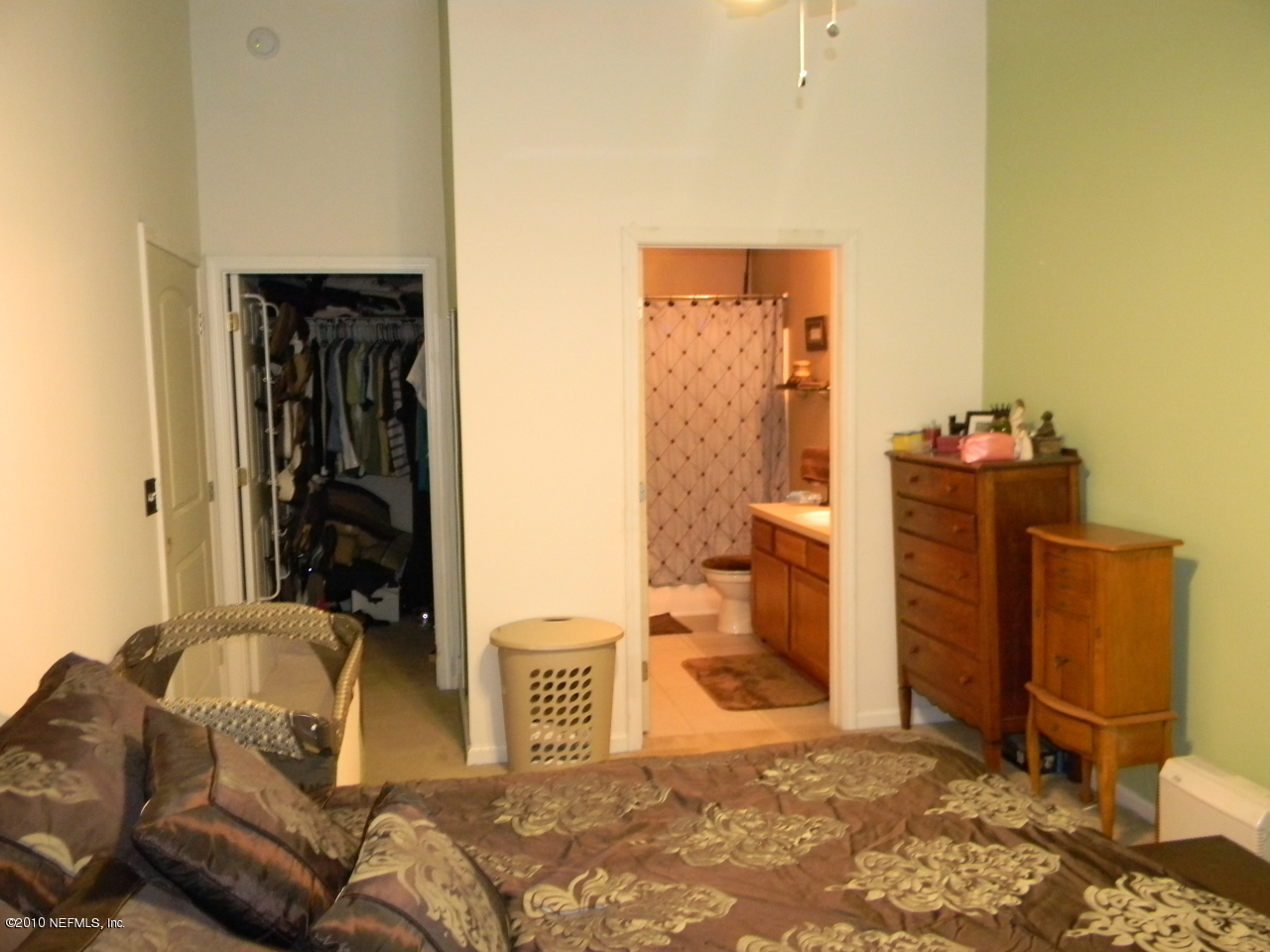 7920 Merrill Road, Unit 714 Jacksonville, FL 32277 - Photo 7 of 12 a living room with furniture and a gate